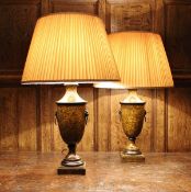 A pair of modern simulated tole ware urn shaped table lamps of faux tortoiseshell colouring,