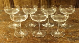 A set of seven Baccarat champagne saucers