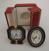 A Cartier travel clock of octagonal form, set with yellow, white and rose gold effect mounts,