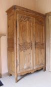 A 19th Century French pine armoire,