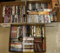 Three boxes of various DVDs, to include "Sharpe", "Moulin Rouge", "Elizabeth The Golden Age",