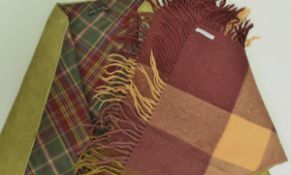 An Yves St Laurent Rive Gauche alpaca and wool checked scarf in autumnal colours together with