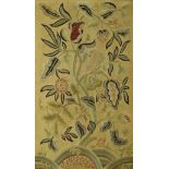 A set of four early 20th Century needlework panels depicting floral sprays,