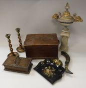 A collection of various treen ware to include a pair of open barley-twist candlesticks,