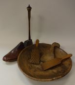 A 19th Century oak pedestal bowl, wooden shoe last, two further treenware bowls,