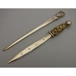A 20th Century silver and gilt paperknife,
