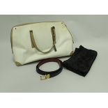 A Gucci cream colour handbag with tan leather mounts together with Gucci protective bag and a Gucci