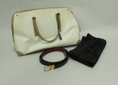 A Gucci cream colour handbag with tan leather mounts together with Gucci protective bag and a Gucci