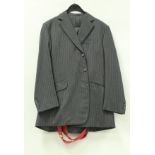 A collection of gentlemen's clothing comprising a Buckleigh of London three piece suit in black and