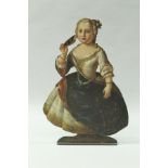 An 18th Century dummy board as a lady of quality, a leaf-shaped fan in her right hand,