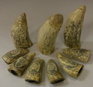 A collection of nine resin scrimshaw sperm whale teeth,