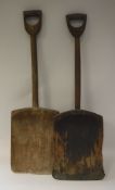 Two vintage wooden grain shovels, one stamped with initials "E.C.