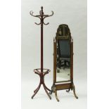 A 20th Century walnut framed cheval mirror in the 18th Century taste,