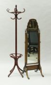 A 20th Century walnut framed cheval mirror in the 18th Century taste,