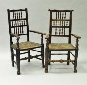 A matched pair of 18th Century North Country spindle back rush seat elbow chairs,