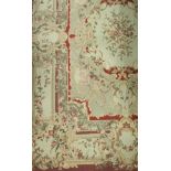 An Aubusson style rug the central panel set with floral decorated medallion on a pale green ground