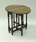 An oak tea table in the 17th Century manner,