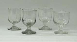 Four various early 19th Century plain glass rummers,