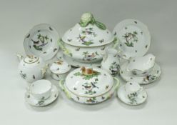 A Herend dinner service comprising large tureen, three vegetable tureens, seventeen soup bowls,