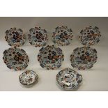 A set of seven 19th Century ironstone china plates in the Imari palette, approx 24 cm diameter,