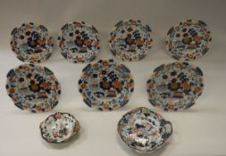 A set of seven 19th Century ironstone china plates in the Imari palette, approx 24 cm diameter,