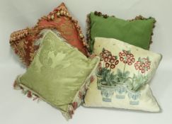 Three boxes of assorted scatter cushions in pink and green hues