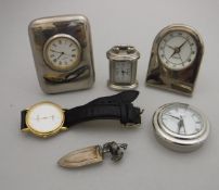 A box of assorted travel clocks and various watches, etc,