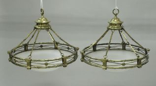 A pair of circa 1900 brass mounted frosted glass plaffoniers in the Regency style with ribbon tied