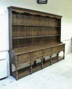 A modern oak dresser in the 18th Century manner,