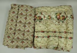 Three chintz patterned eiderdowns