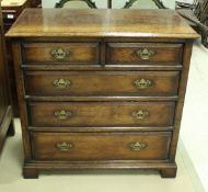 An oak chest in the 18th Century manner,