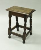 A joined oak stool in the 17th Century manner,