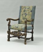 An 18th Century walnut framed armchair in the Flemish taste,