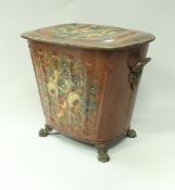 A 19th Century tole ware log bin with painted decoration of floral sprays on a red ground,