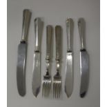 A collection of assorted plated cutlery to include fish knives and forks,