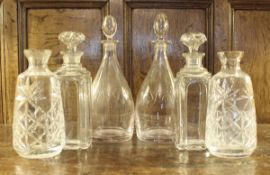 A pair of mid 20th Century decanters of plain form with plain stoppers, 33 cm high,