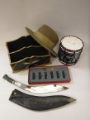 A collection of various Gurkha ephemera including ice bucket, stationery holder, desk tidy,