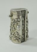 A 19th Century Chinese export silver lidded pepper or pounce pot with prunus decoration bears