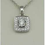 An 18 carat white gold diamond-set pendant,