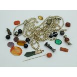 A collection of assorted hardstone cut cameos,