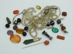 A collection of assorted hardstone cut cameos,