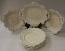 A Victorian buff ware relief work decorated dessert service by W Ridgway Son & Co.