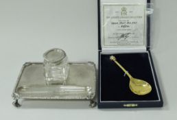 A George V silver desk stand with silver mounted inkwell,