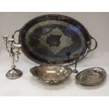 A large silver-plated twin-handled tray with engraved decoration,