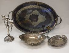 A large silver-plated twin-handled tray with engraved decoration,