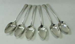 A set of six George III silver feathered edge table spoons (by Josiah and George Piercy,