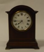 An Edwardian mahogany and inlaid cased mantel clock the circular dial with Roman numerals