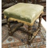 An 18th Century walnut framed stool,