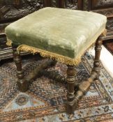 An 18th Century walnut framed stool,