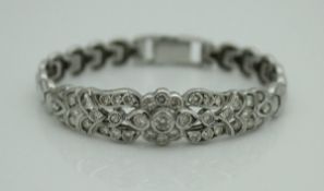 An un-marked white gold and diamond set bracelet,